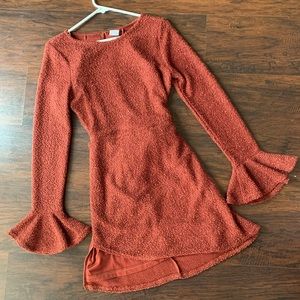 Rust colored selfie Leslie dress with bell bottom sleeves